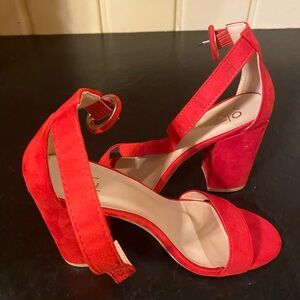 Red heels size 7.5 never worn